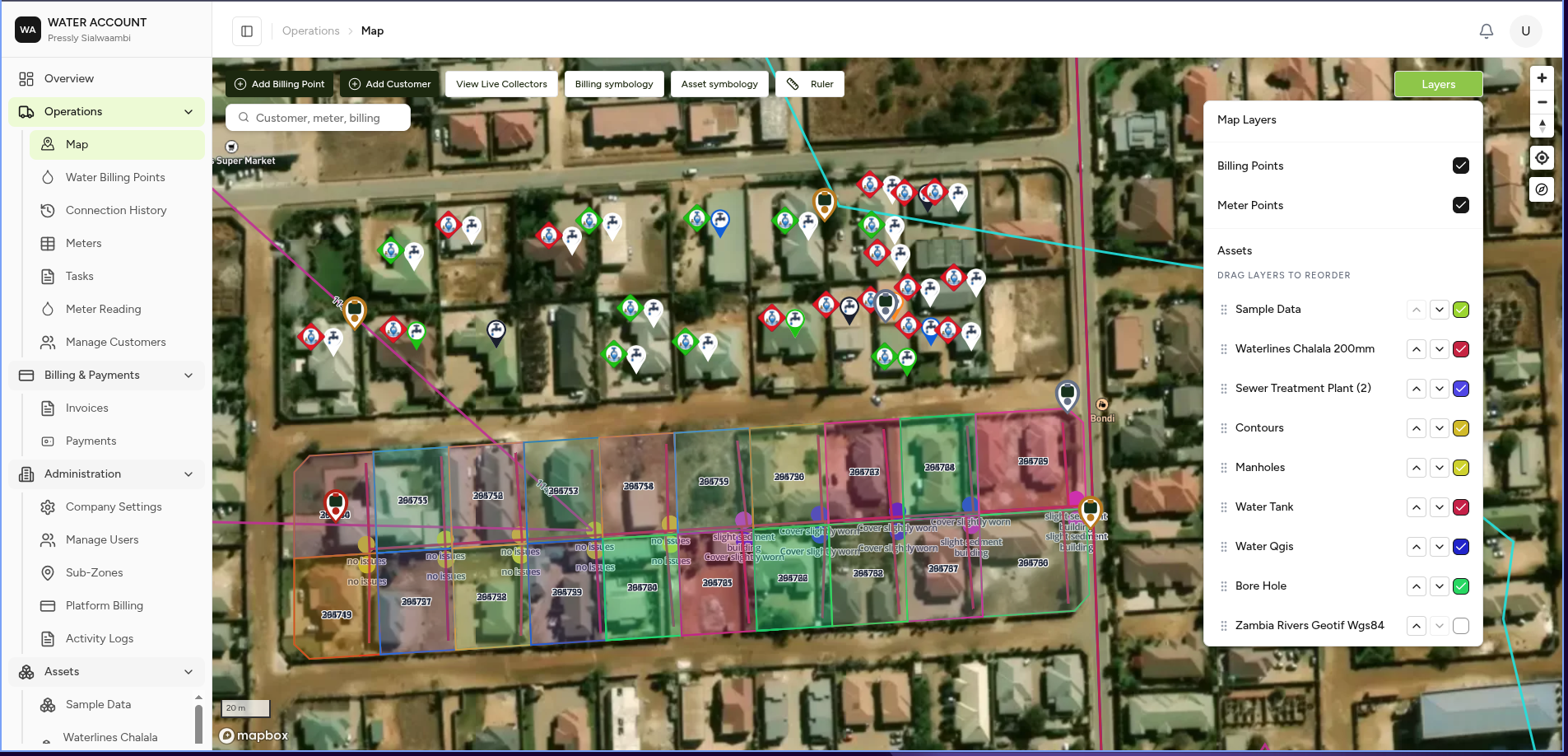 Operations Map showing plots, manholes, contours, and a water tank with layers open